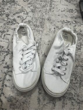 White slip on laced sneakers
